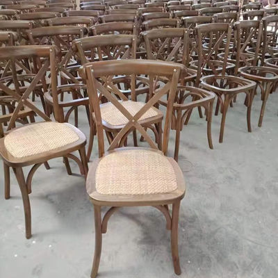 Professionele stapelbare X Back Rattan Eetstoel Frans Accent Houten Stoel voor trouwfeest in aangepaste kleuren