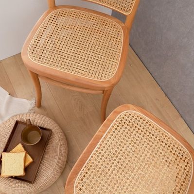 Huismeubelen Houten rotan eetstoel met modern design