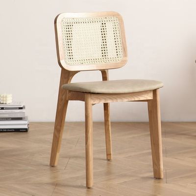 Creëer een luxe eetbeleving met Nordic Light Luxury Solid Wood Rattan Back Leather Chair