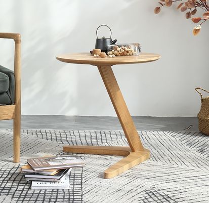 Moderne ronde koffietafel met massief houten onderstel