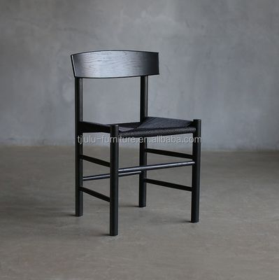 Eetstoel van massief hout met lage ronde rug Rattan stoel met modern en traditioneel ontwerpconcept