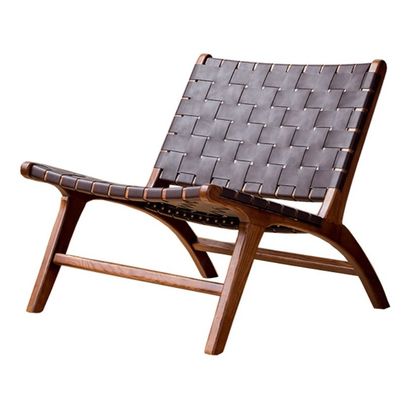Zware houten zadel leer eengezamen woonkamer sofa stoel hotel essentieel