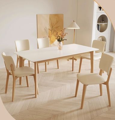 Moderne Nordic Design Eettafel van massief hout met zwarte/witte PU lederen stoelen en Nordic stijl
