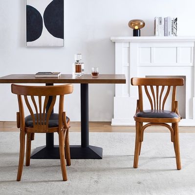 Hotelarmloze eetstoel met houten structuur